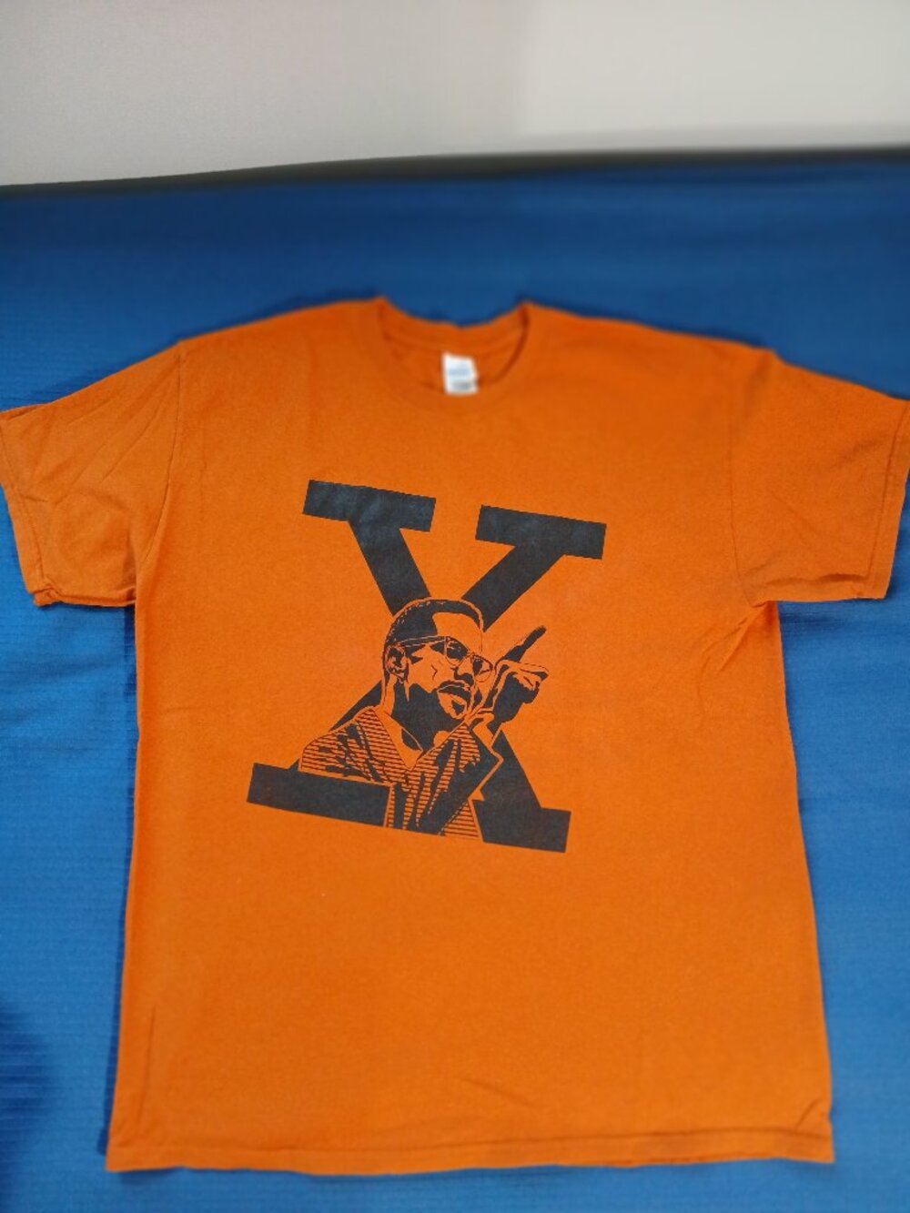 Vintage  burnt orange Malcolm X  t shirt.   Large